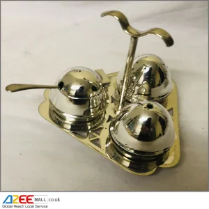 Silver plated salt and pepper shakers with mustard pot, spoon and stand